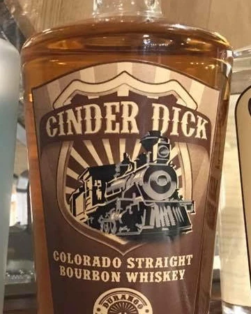 Cinder Dick Colorado Straight Bourbon Whiskey bottle label with a steam locomotive