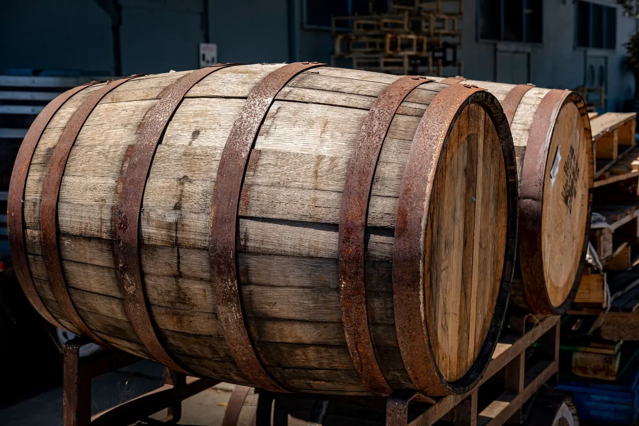A dark charred oak barrel